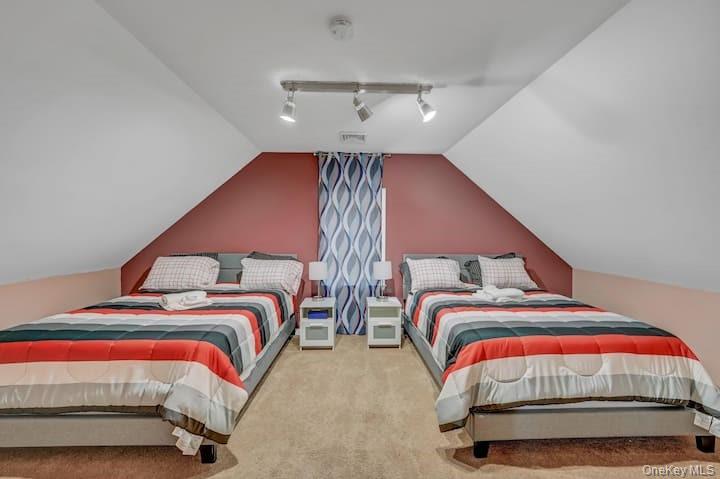 73 Mountain Road Bloomingburg, NY 12721 - Photo 16 of 19 a bedroom with bed and a chandelier