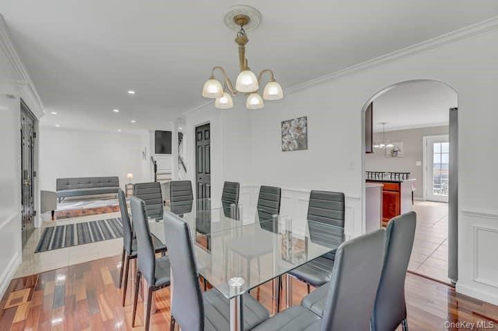 73 Mountain Road Bloomingburg, NY 12721 - Photo 9 of 19 a view of a dining room with furniture and a chandelier