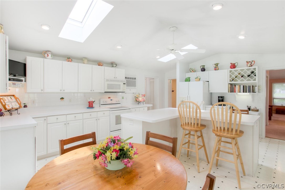224 Wister Road Colonial Beach, VA 22443 - Photo 3 of 50 Kitchen is Loaded with Cabinets, Wine Rack & Break