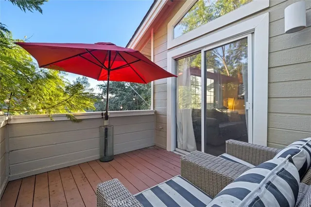 a view of a balcony with furniture