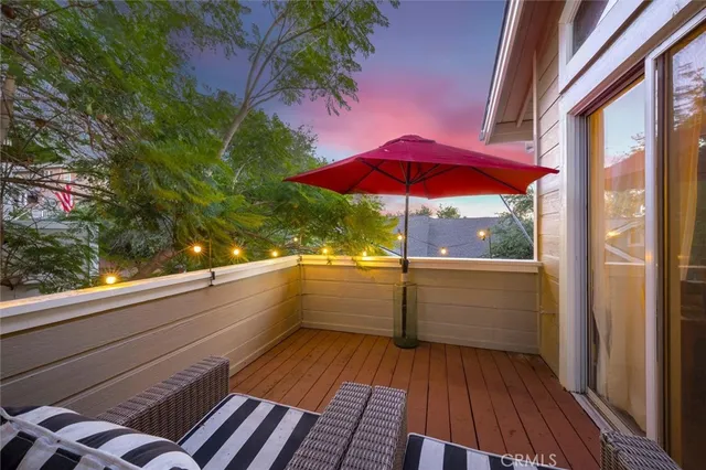 a view of a balcony with an outdoor space