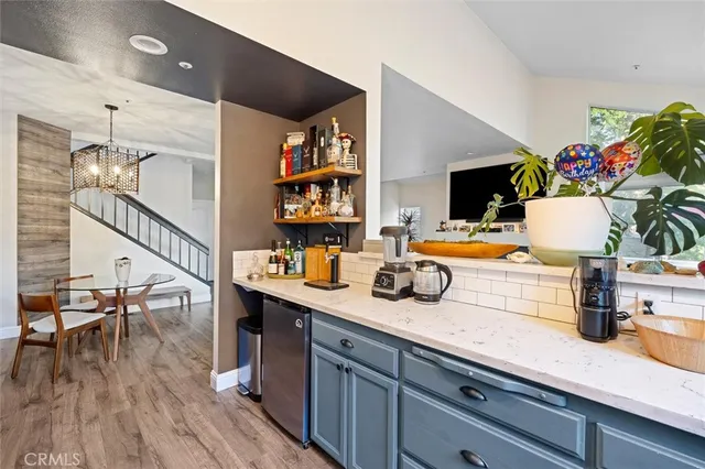 a room with furniture and wooden floor