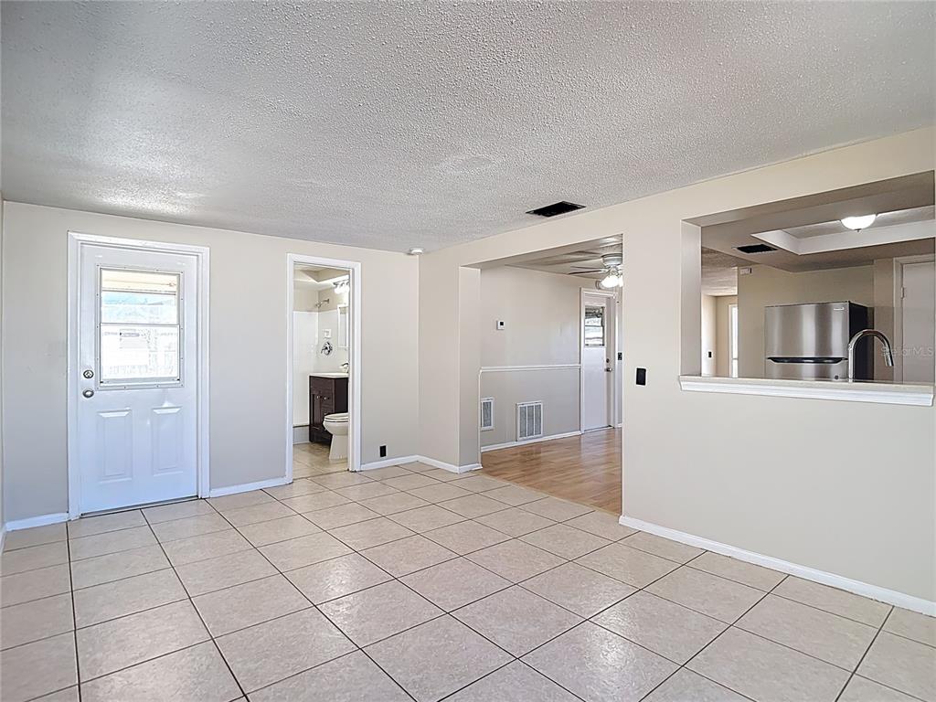 10806 Jason Road Port Richey, FL 34668 - Photo 19 of 46 a view of an empty room and window