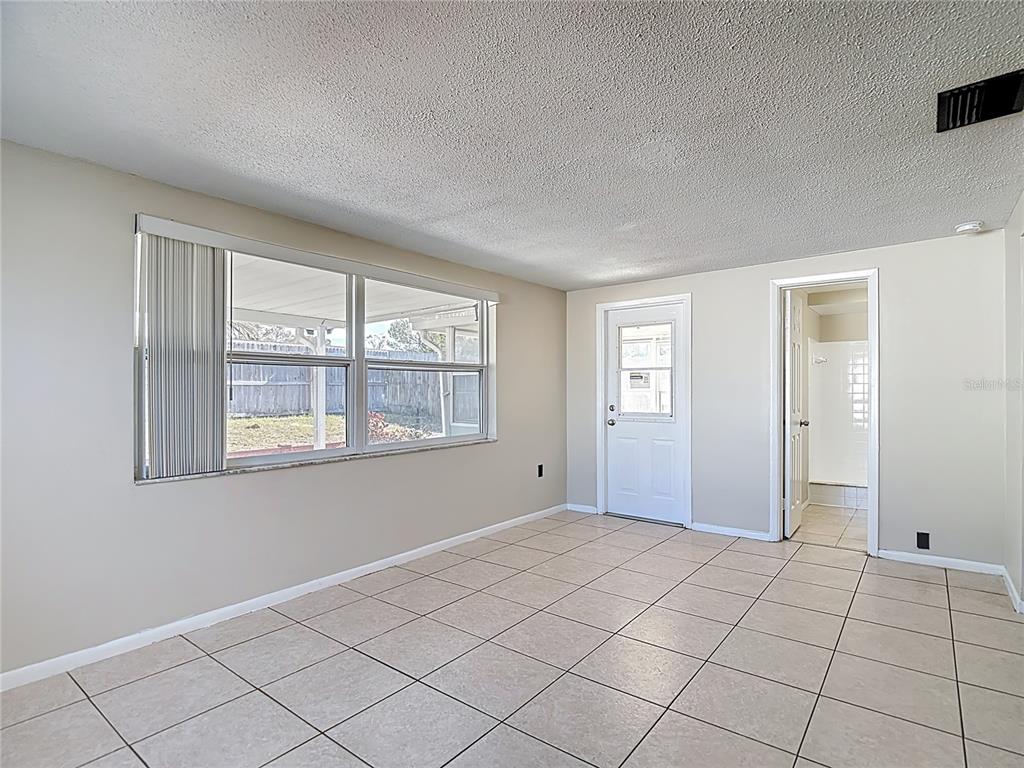 10806 Jason Road Port Richey, FL 34668 - Photo 20 of 46 a view of an empty room with window