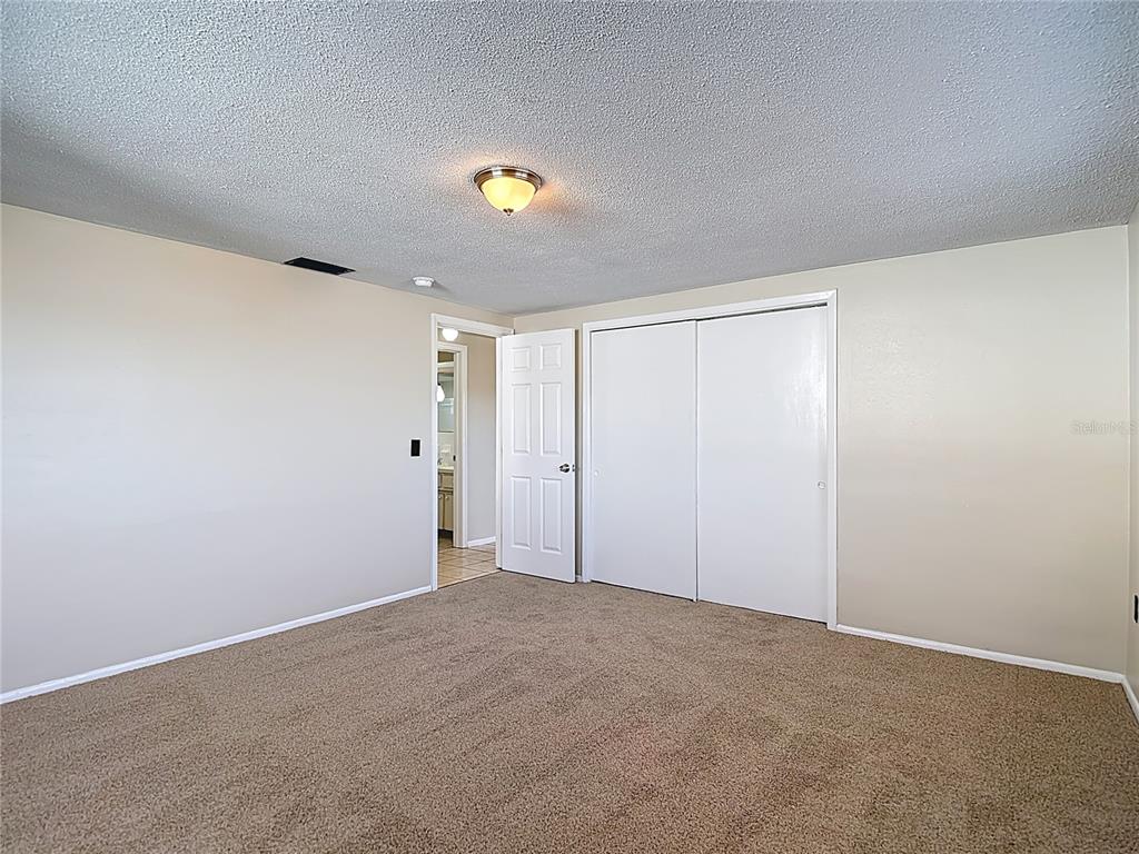 10806 Jason Road Port Richey, FL 34668 - Photo 23 of 46 a view of an empty room