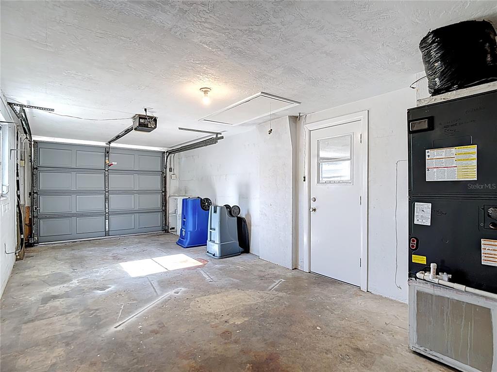 10806 Jason Road Port Richey, FL 34668 - Photo 33 of 46 a view of a garage room