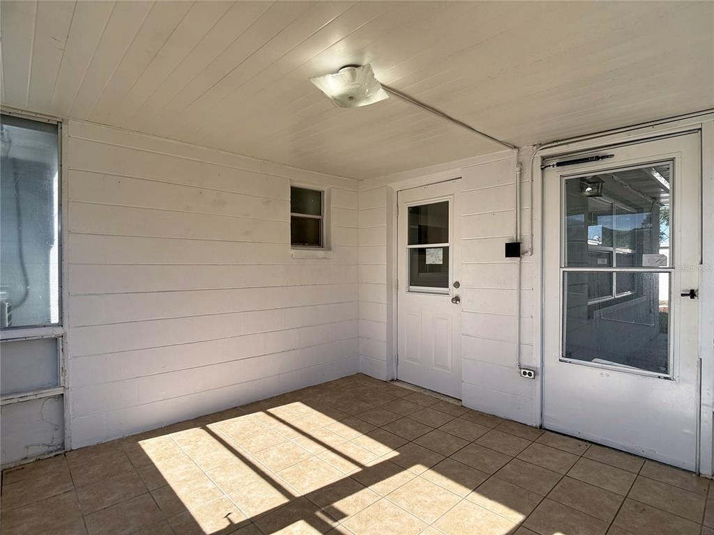 10806 Jason Road Port Richey, FL 34668 - Photo 37 of 46 a view of an empty room and window