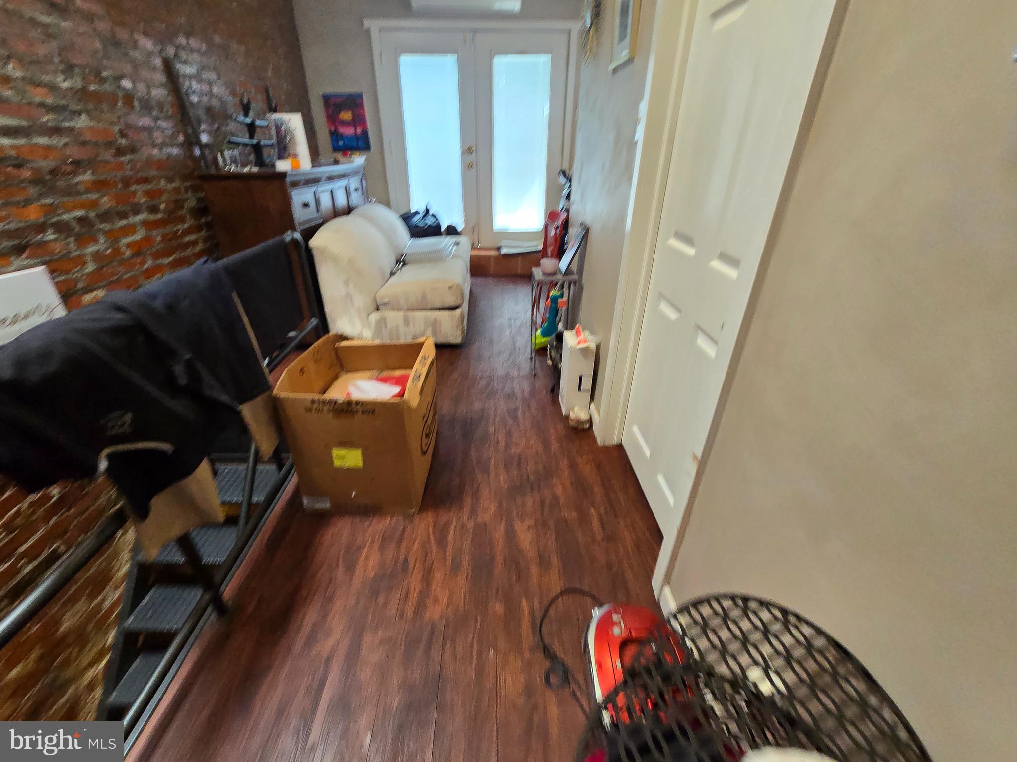 1211 North 60th Street Philadelphia, PA 19151 - Photo 12 of 14 a living room with furniture and wooden floor