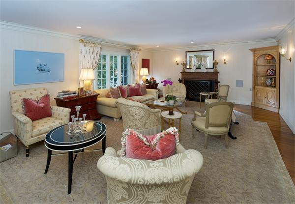 262 Woodland Road Brookline, MA 02467 - Photo 4 of 29 a living room with furniture a fireplace and a window