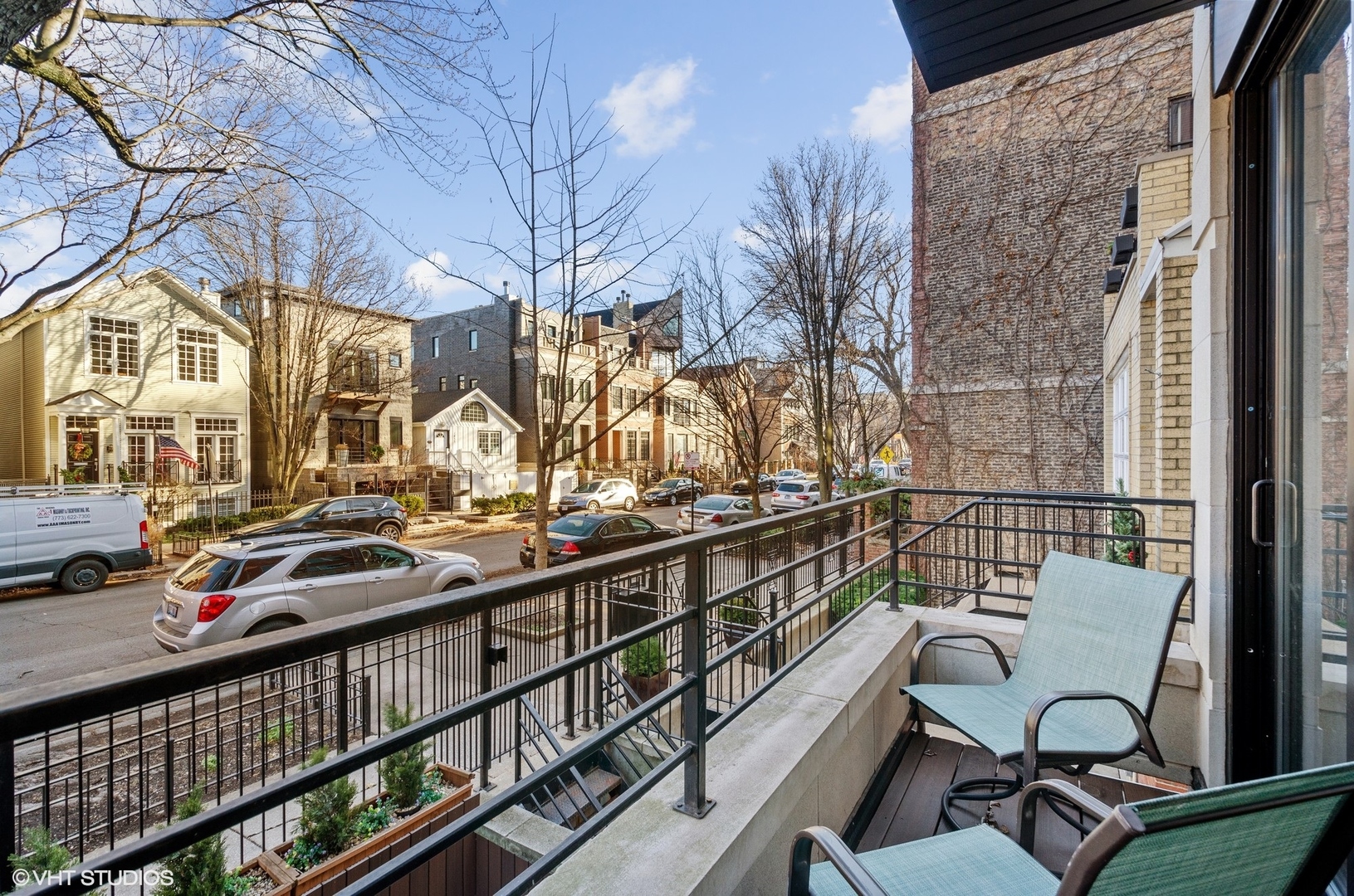 1442 North Mohawk Street, Unit 1 Chicago, IL 60610 - Photo 4 of 15 a view of a chairs and table in the balcony