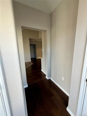 a view of a city from a balcony with outdoor space