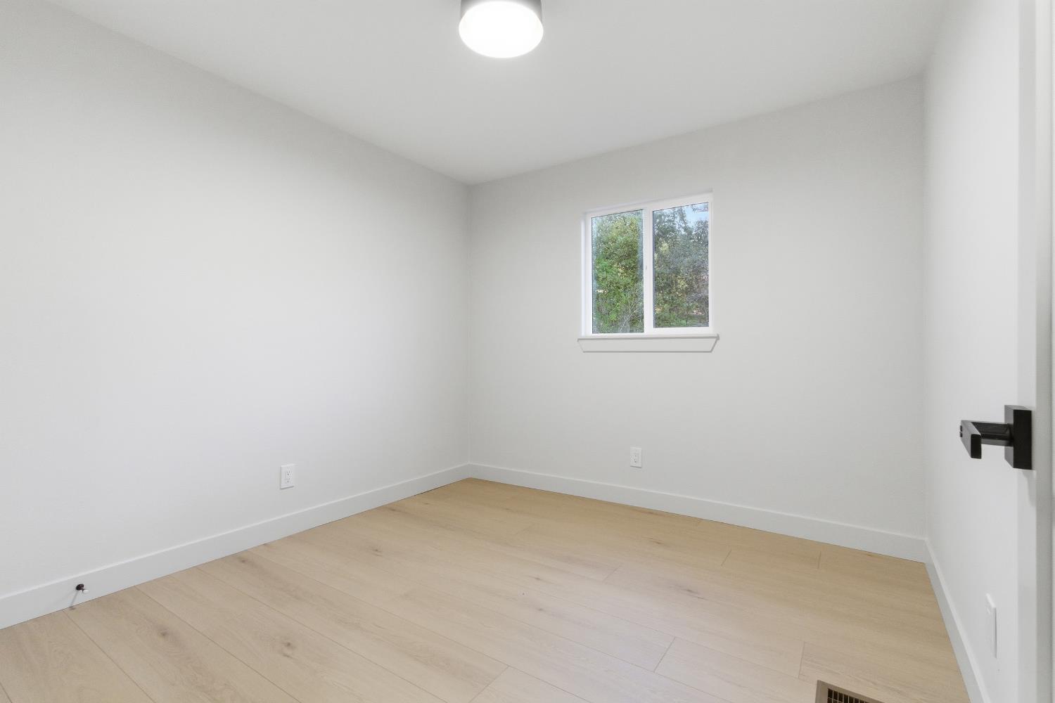 4117 El Dorado Road Placerville, CA 95667 - Photo 18 of 54 an empty room with a window