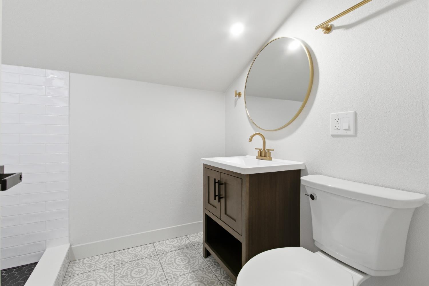 4117 El Dorado Road Placerville, CA 95667 - Photo 22 of 54 a bathroom with a toilet a sink and mirror
