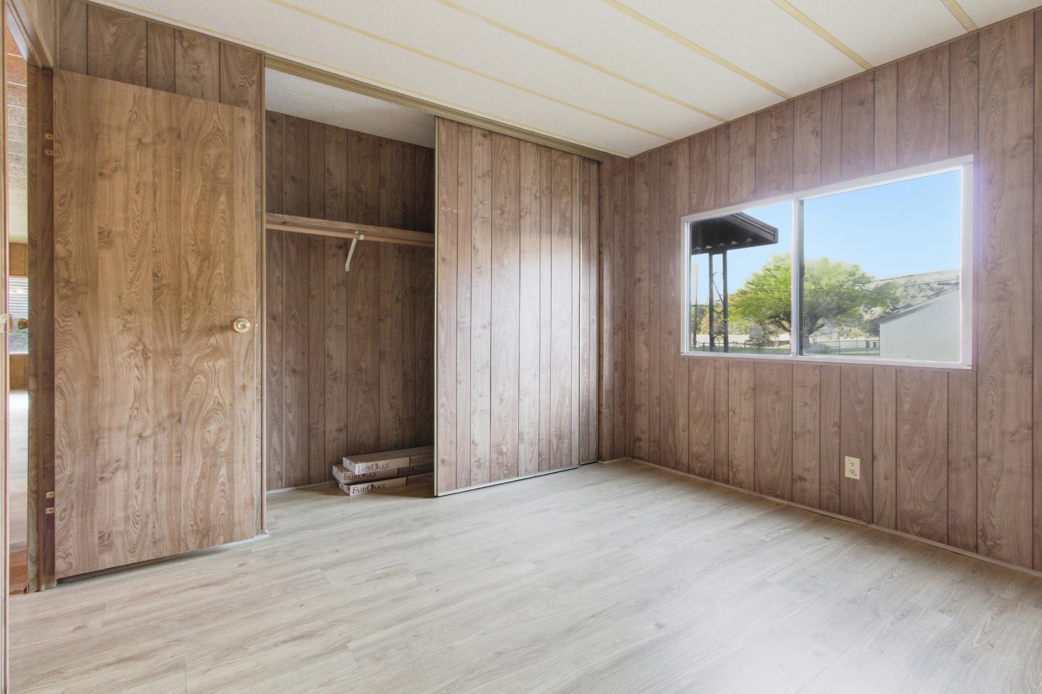 4117 El Dorado Road Placerville, CA 95667 - Photo 46 of 54 a view of an empty room with wooden floor and a window