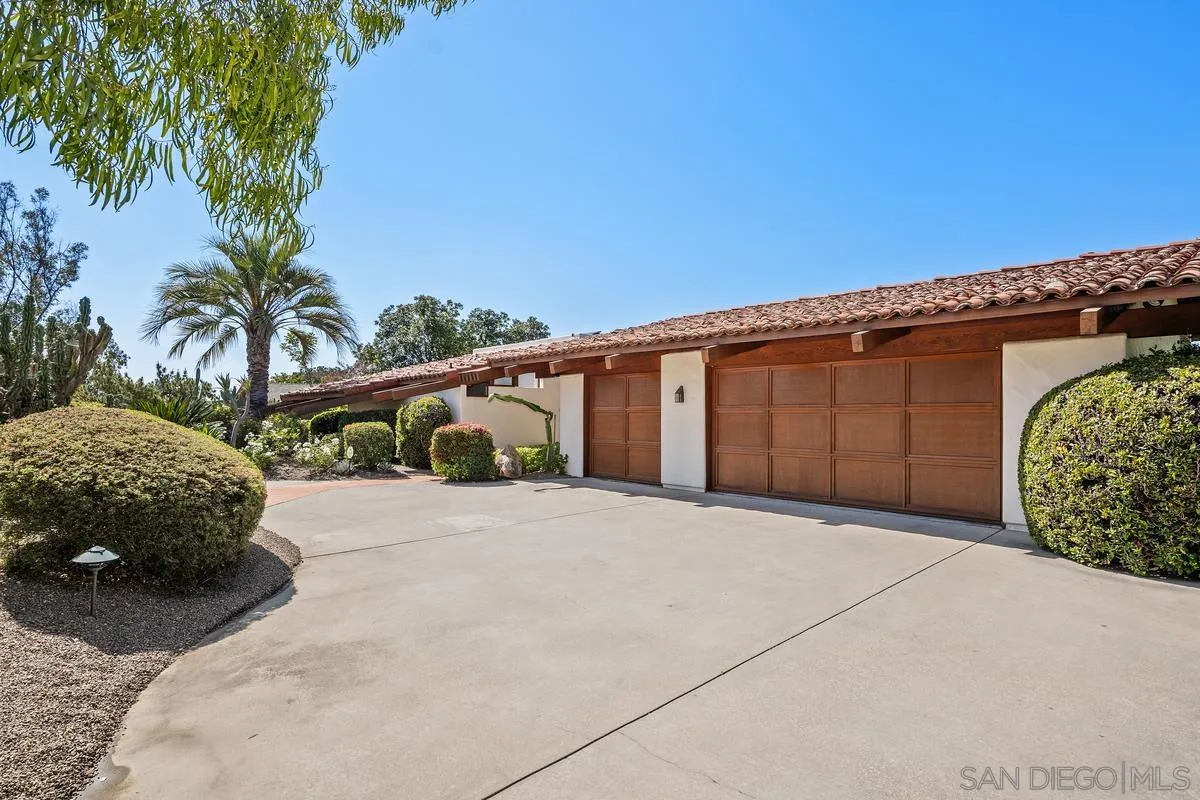 13622 Orchard Gate Road Poway, CA 92064 - Photo 3 of 40 a view of a house with a garage