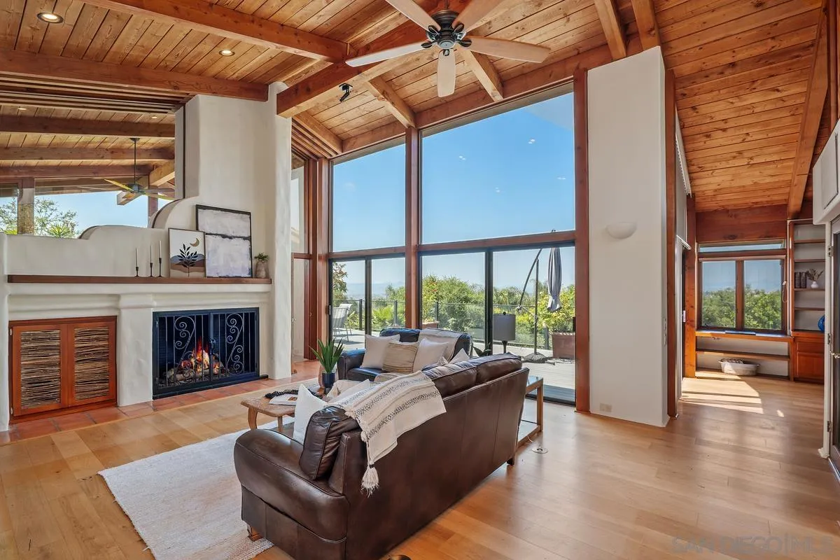 13622 Orchard Gate Road Poway, CA 92064 - Photo 9 of 40 a living room with furniture and a fireplace