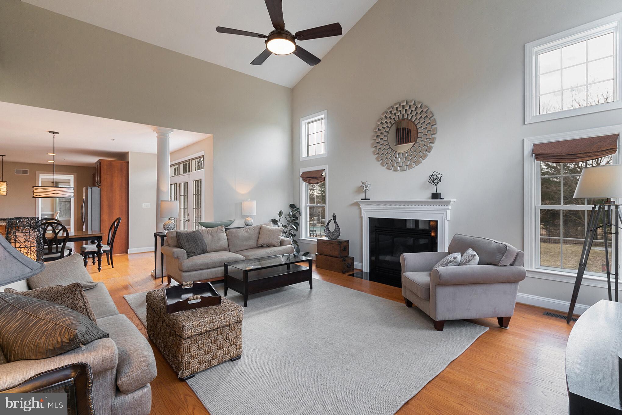 6508 Griffith Road Laytonsville, MD 20882 - Photo 16 of 35 Family Room with 2nd Staircase and Gas Fireplace