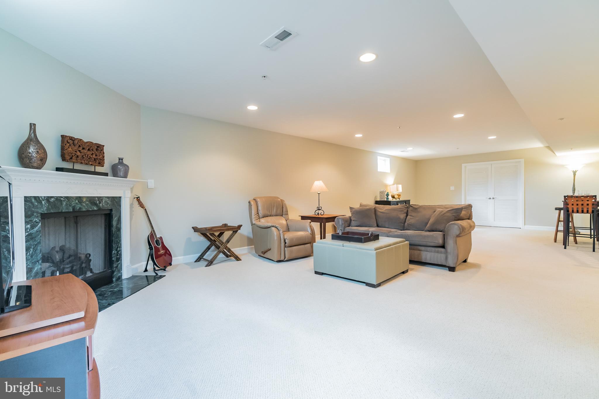 6508 Griffith Road Laytonsville, MD 20882 - Photo 27 of 35 Finished Basement with Gas Fireplace