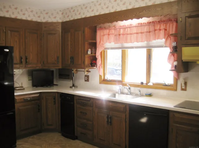 a room with furniture and a window