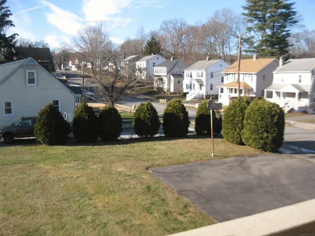 a kitchen with a sink cabinets and appliances