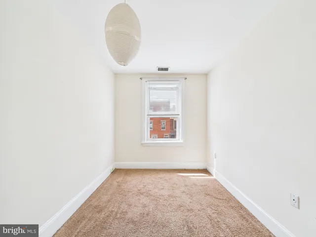 an empty room with a window