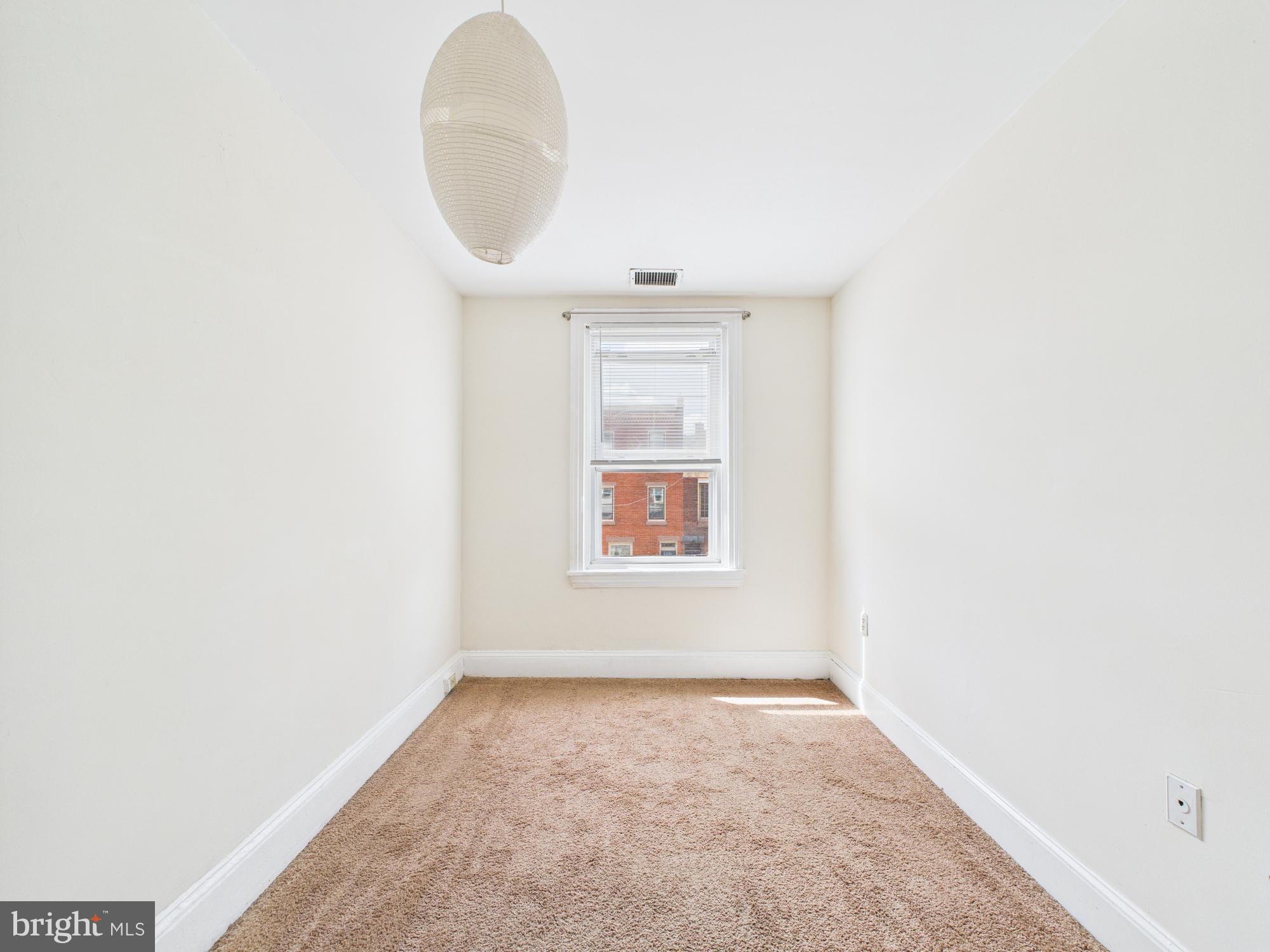 3829 Hamilton Street, Unit C Philadelphia, PA 19104 - Photo 11 of 17 an empty room with a window