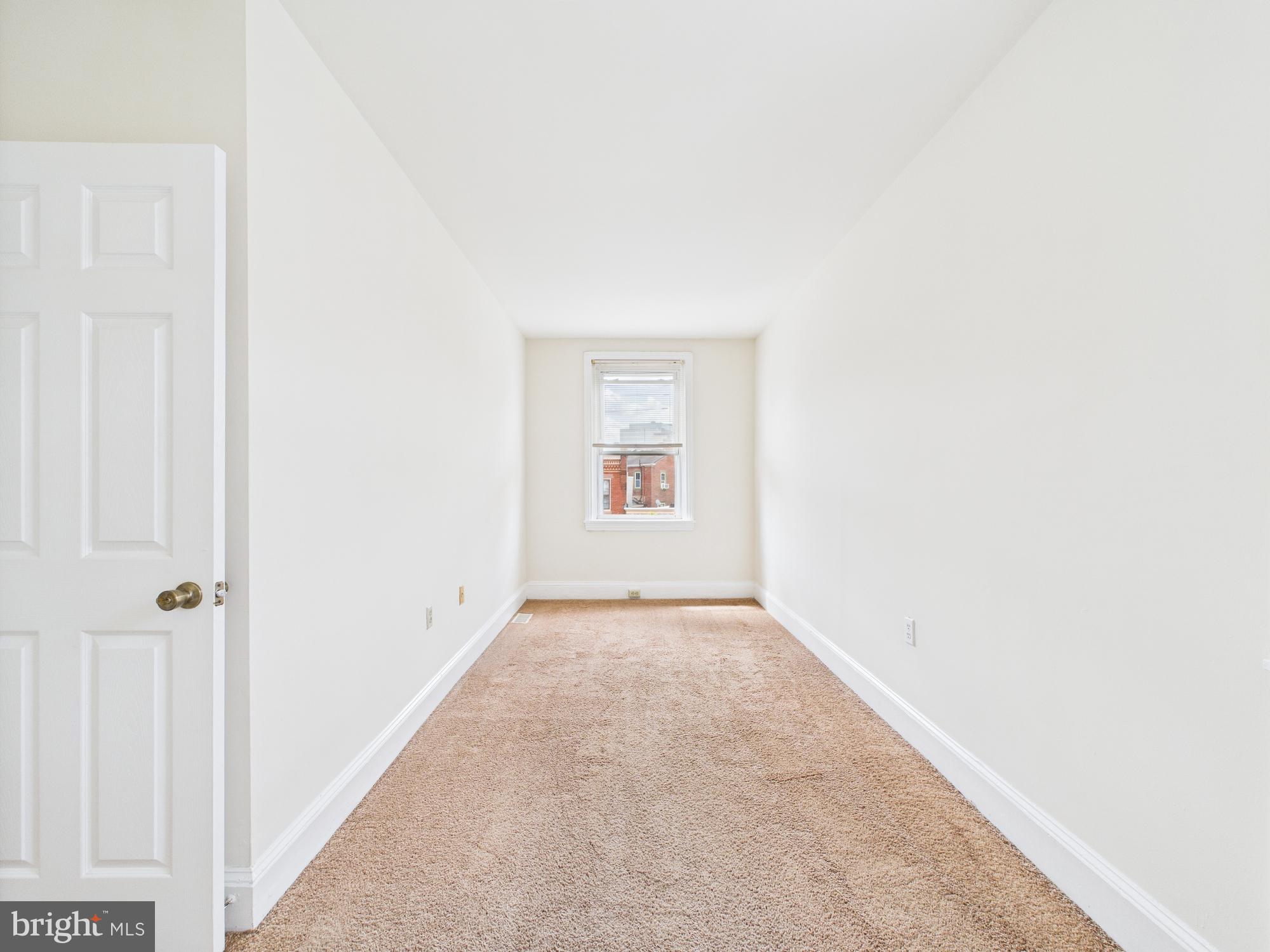 3829 Hamilton Street, Unit C Philadelphia, PA 19104 - Photo 14 of 17 an empty room with windows