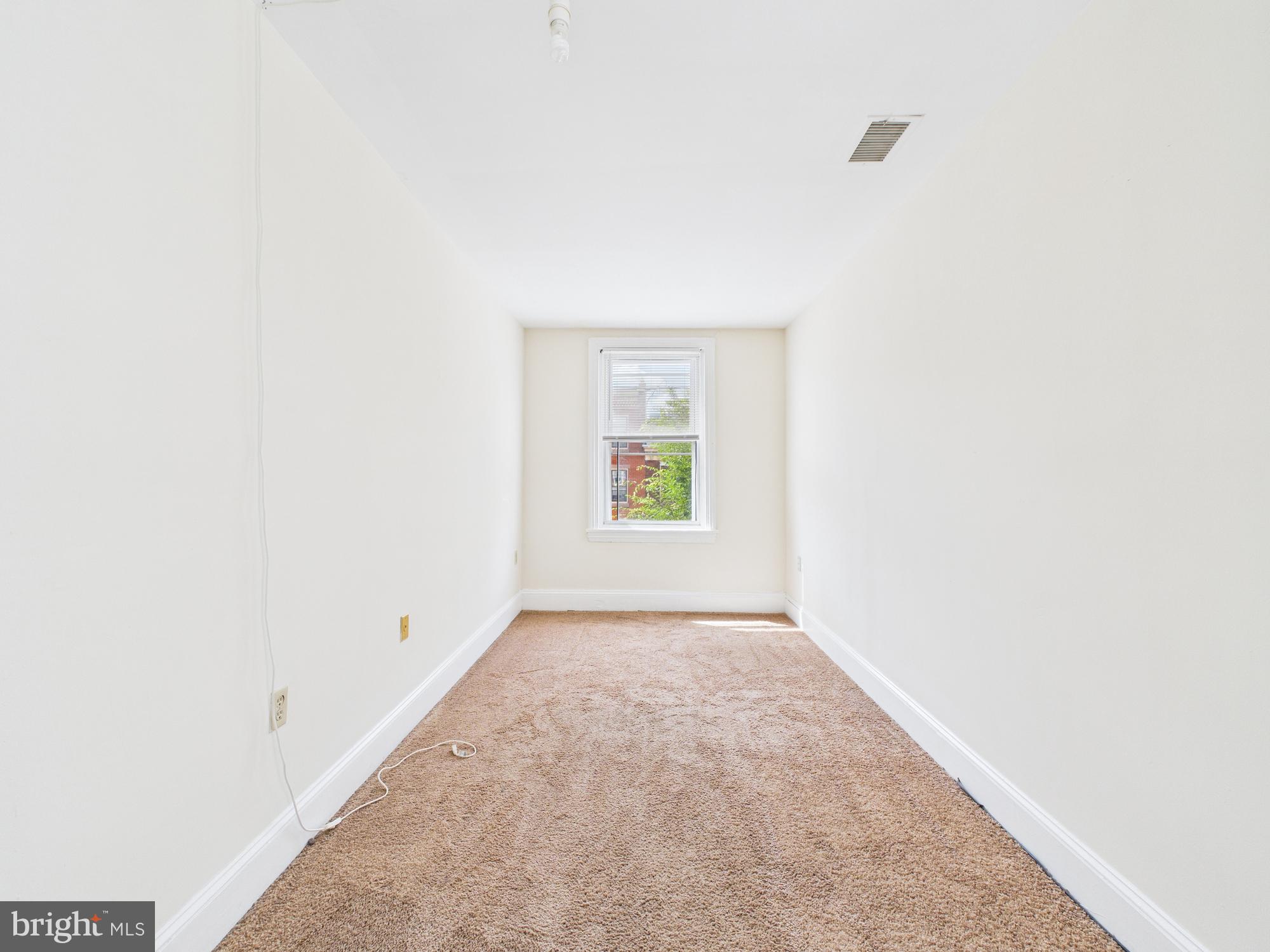 3829 Hamilton Street, Unit C Philadelphia, PA 19104 - Photo 10 of 17 a view of an empty room with a window