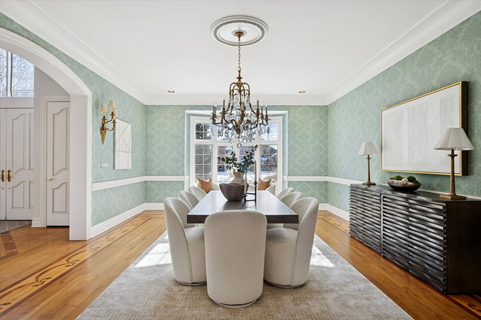 15W260 62nd Street Burr Ridge, IL 60527 - Photo 13 of 48 a dining room with furniture a chandelier and wooden floor