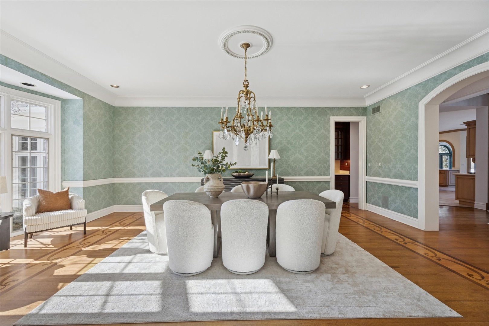 15W260 62nd Street Burr Ridge, IL 60527 - Photo 15 of 48 a living room with table chairs and a chandelier