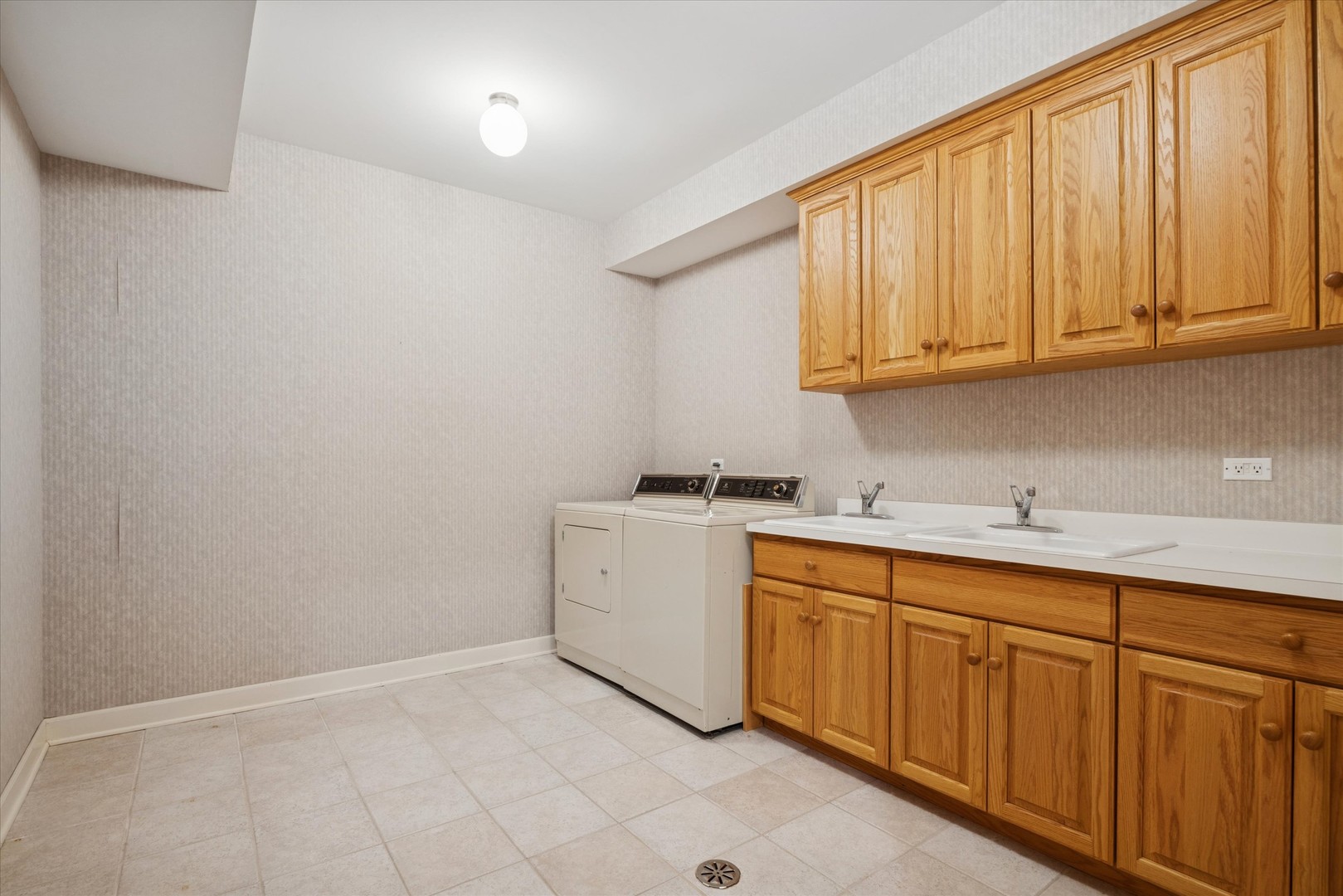15W260 62nd Street Burr Ridge, IL 60527 - Photo 38 of 48 a room with a sink cabinets and utility room