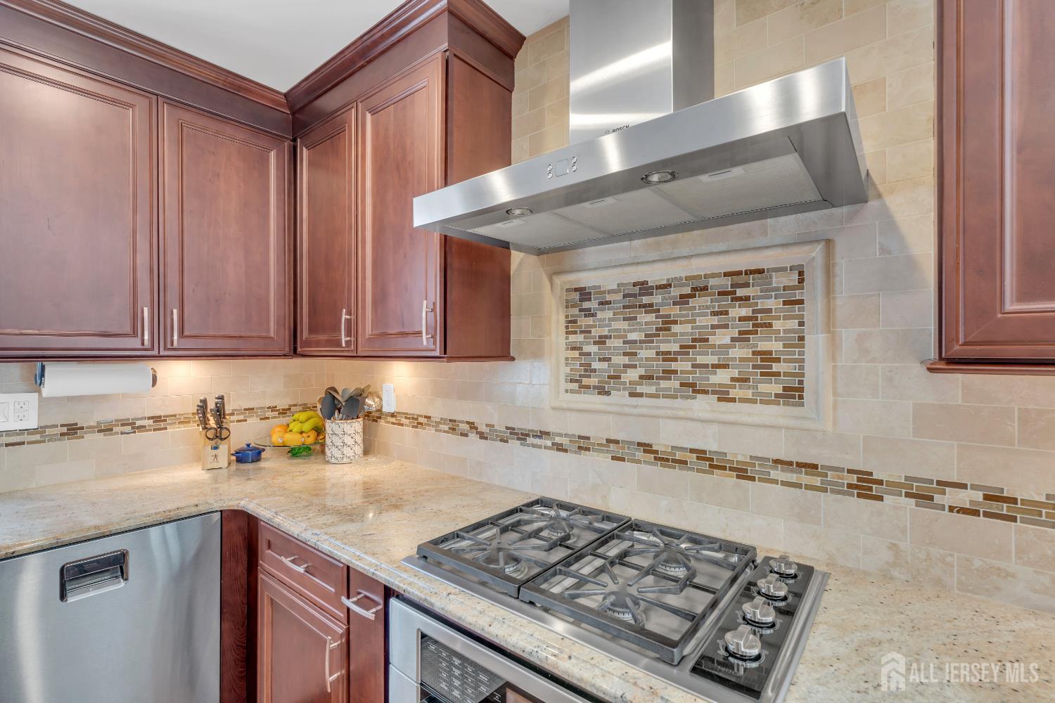 42 Ridge Road Edison, NJ 08817 - Photo 15 of 47 a kitchen with a sink stove and cabinets