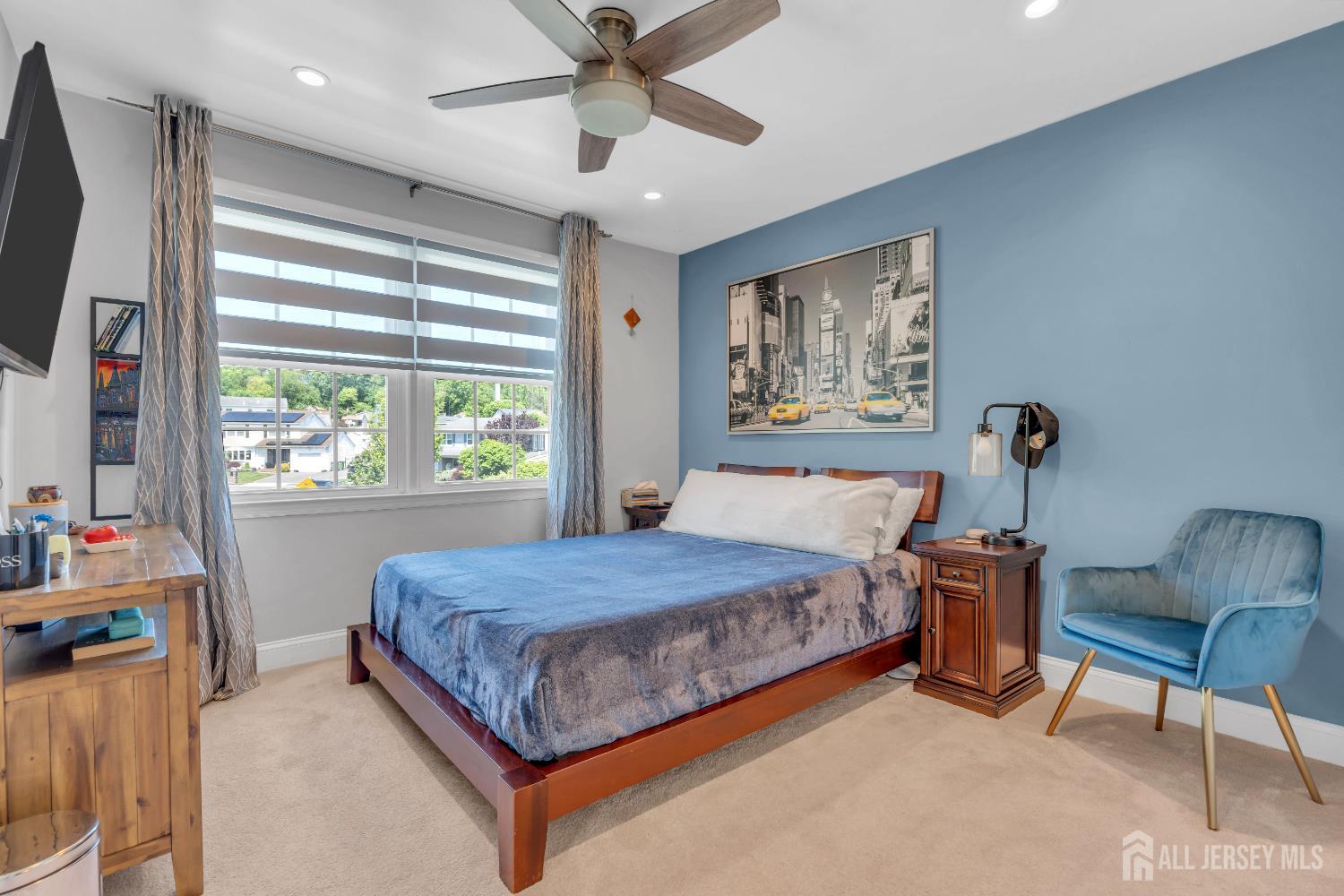 42 Ridge Road Edison, NJ 08817 - Photo 26 of 47 a bedroom with a bed and a window