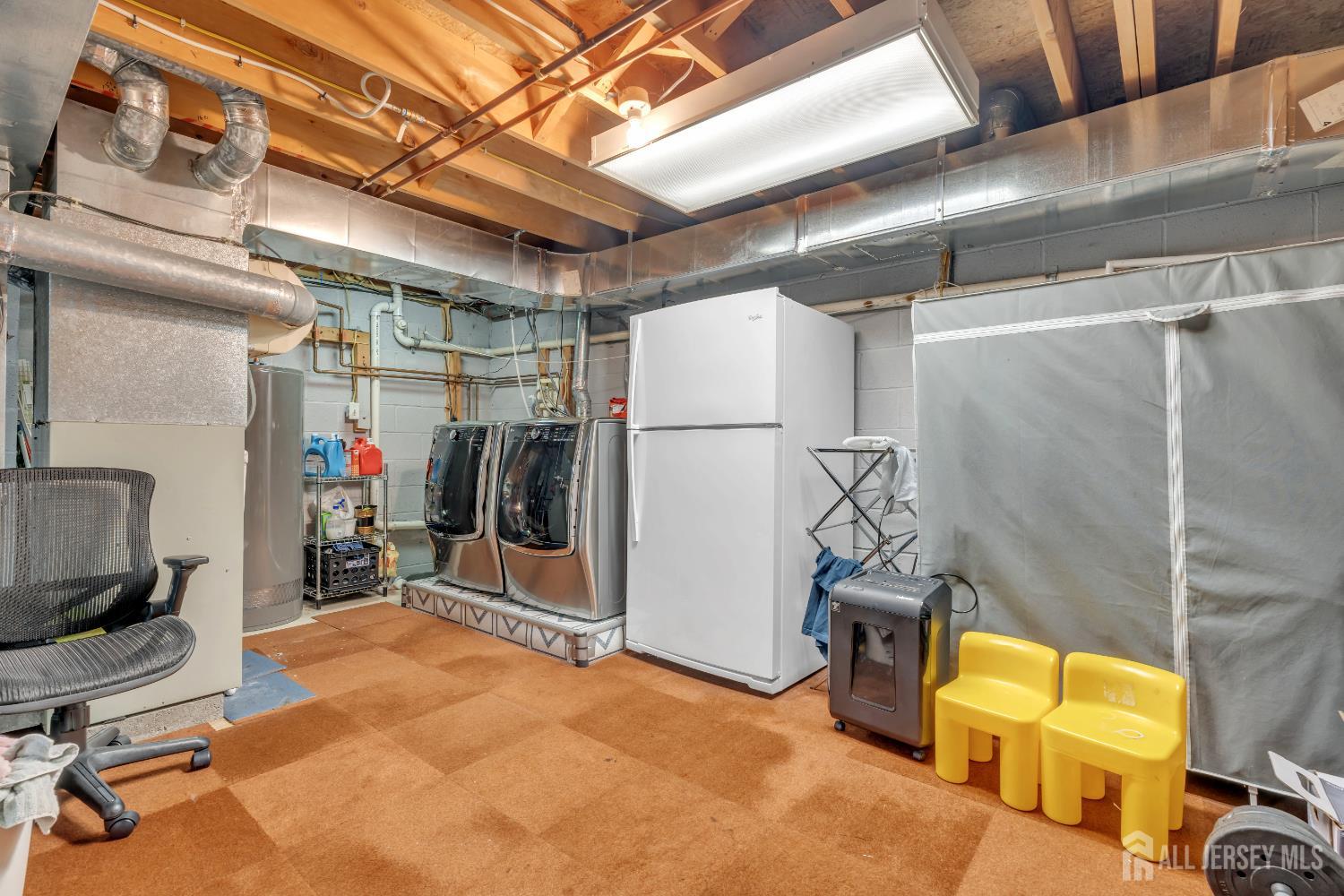 42 Ridge Road Edison, NJ 08817 - Photo 34 of 47 a view of a room with gym equipment