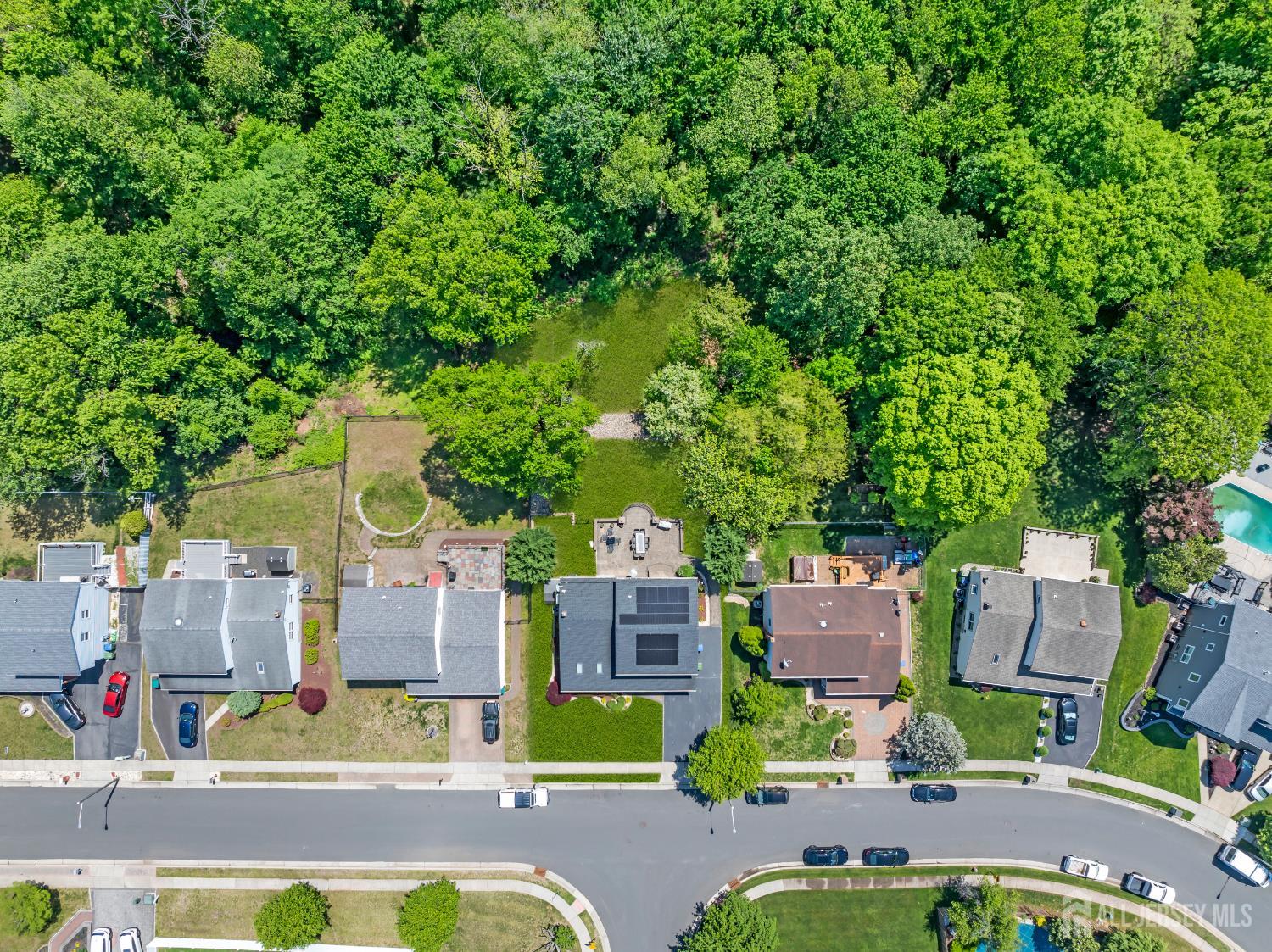42 Ridge Road Edison, NJ 08817 - Photo 5 of 47 an aerial view of residential houses with outdoor space
