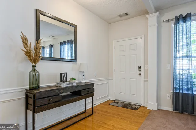 a view of a livingroom with furniture and windows