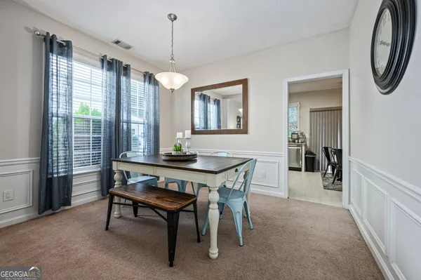 a view of a livingroom with furniture and window