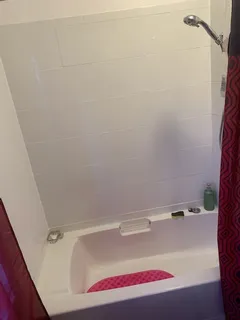 a bathroom with a bathtub