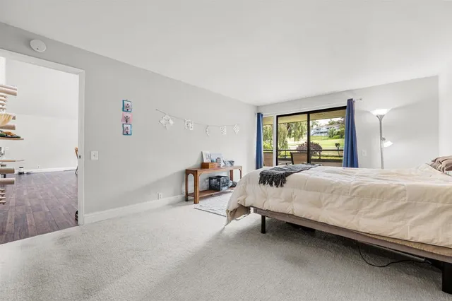 a bed room with a bed and a couch