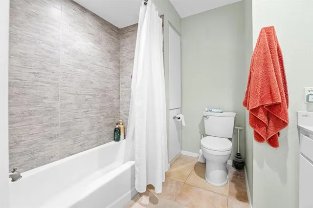a bathroom with a sink vanity and mirror