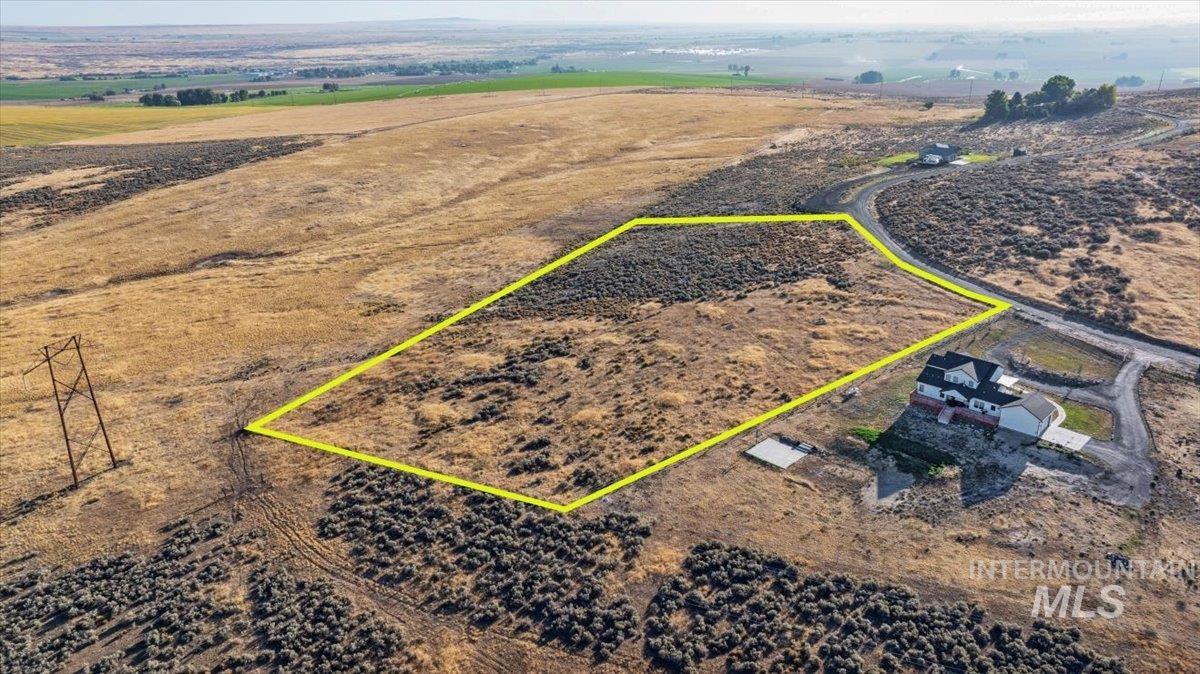 939 Skeleton Butte Road Eden, ID 83325 - Photo 5 of 12 Aerial view of sparsely populated area featuring property boundaries highlighted
