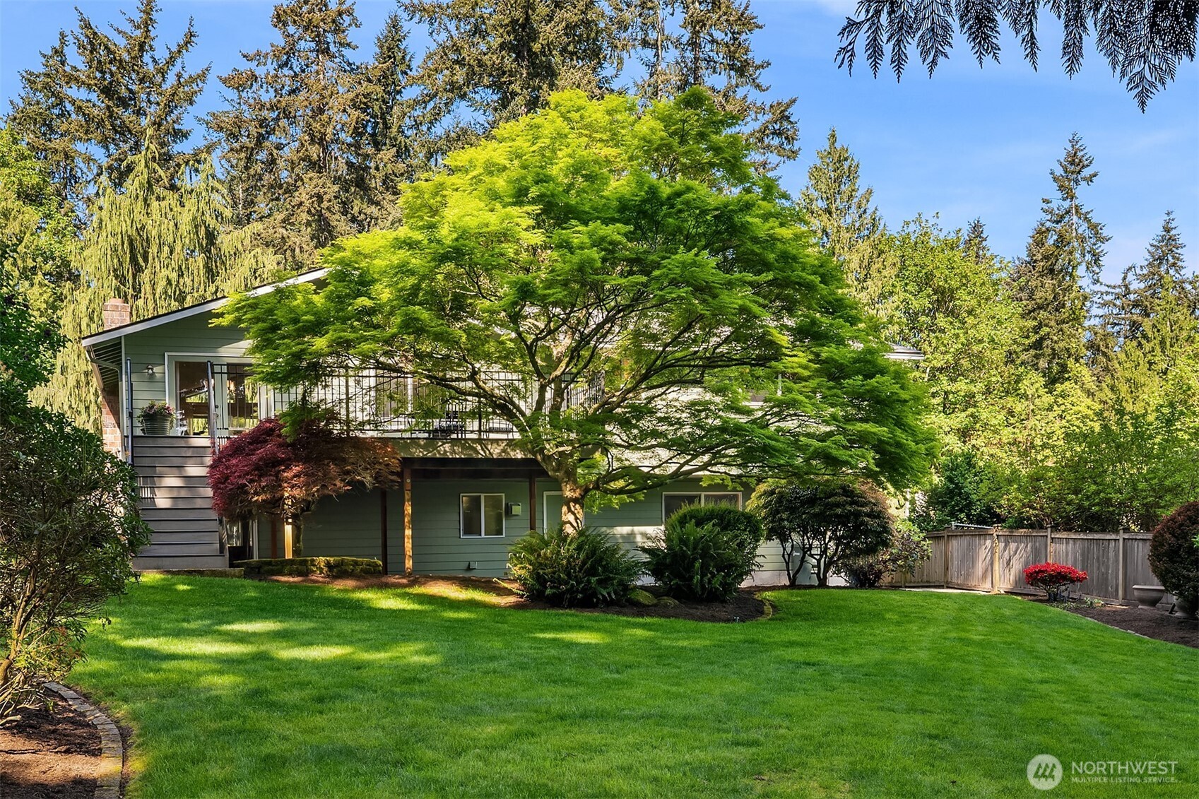 21331 2nd Avenue Southeast Bothell, WA 98021 - Photo 30 of 34 a view of a house with a yard
