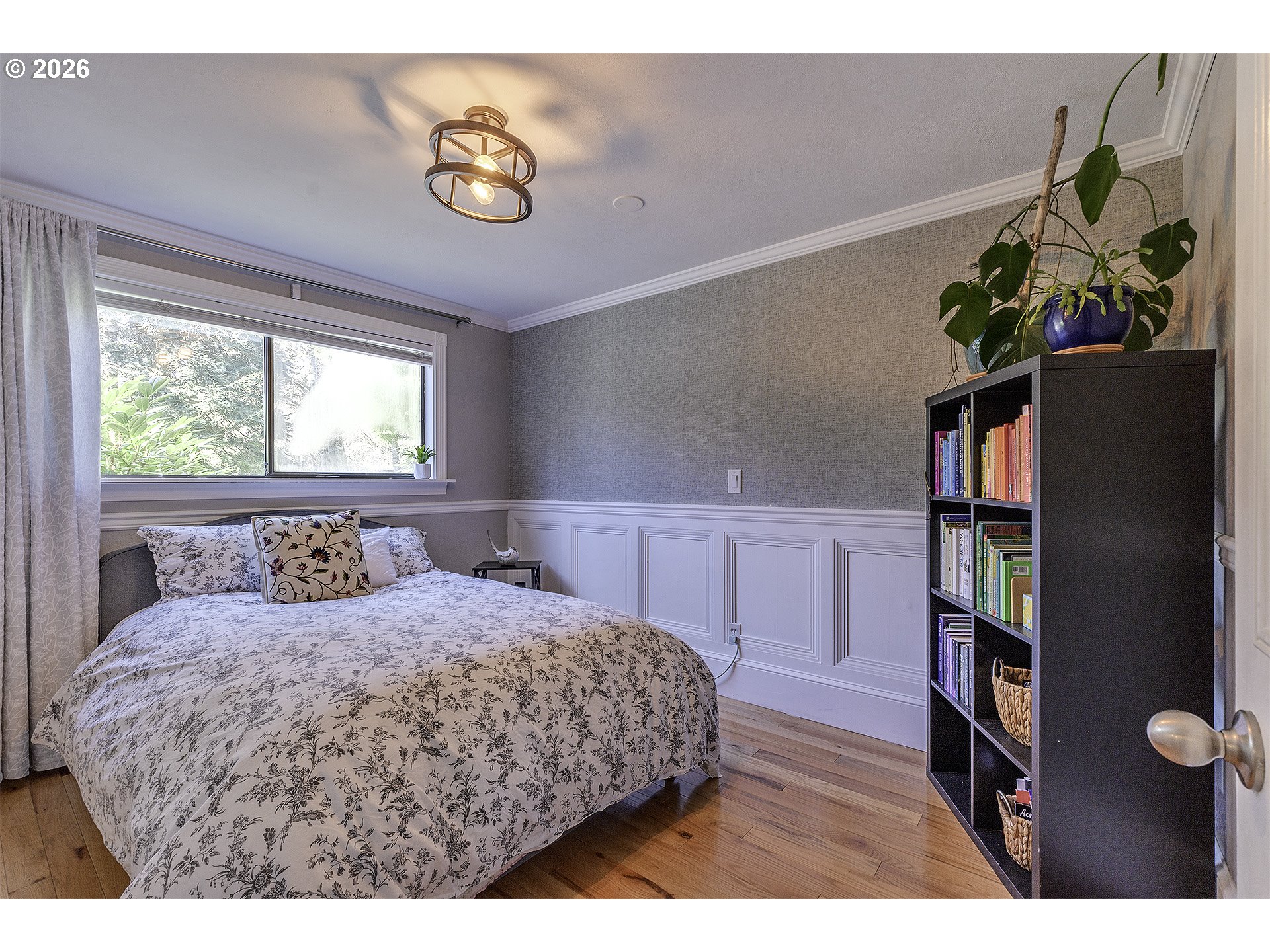 34049 West Campbell Loop Seaside, OR 97138 - Photo 18 of 48 a bedroom with a bed table and a window