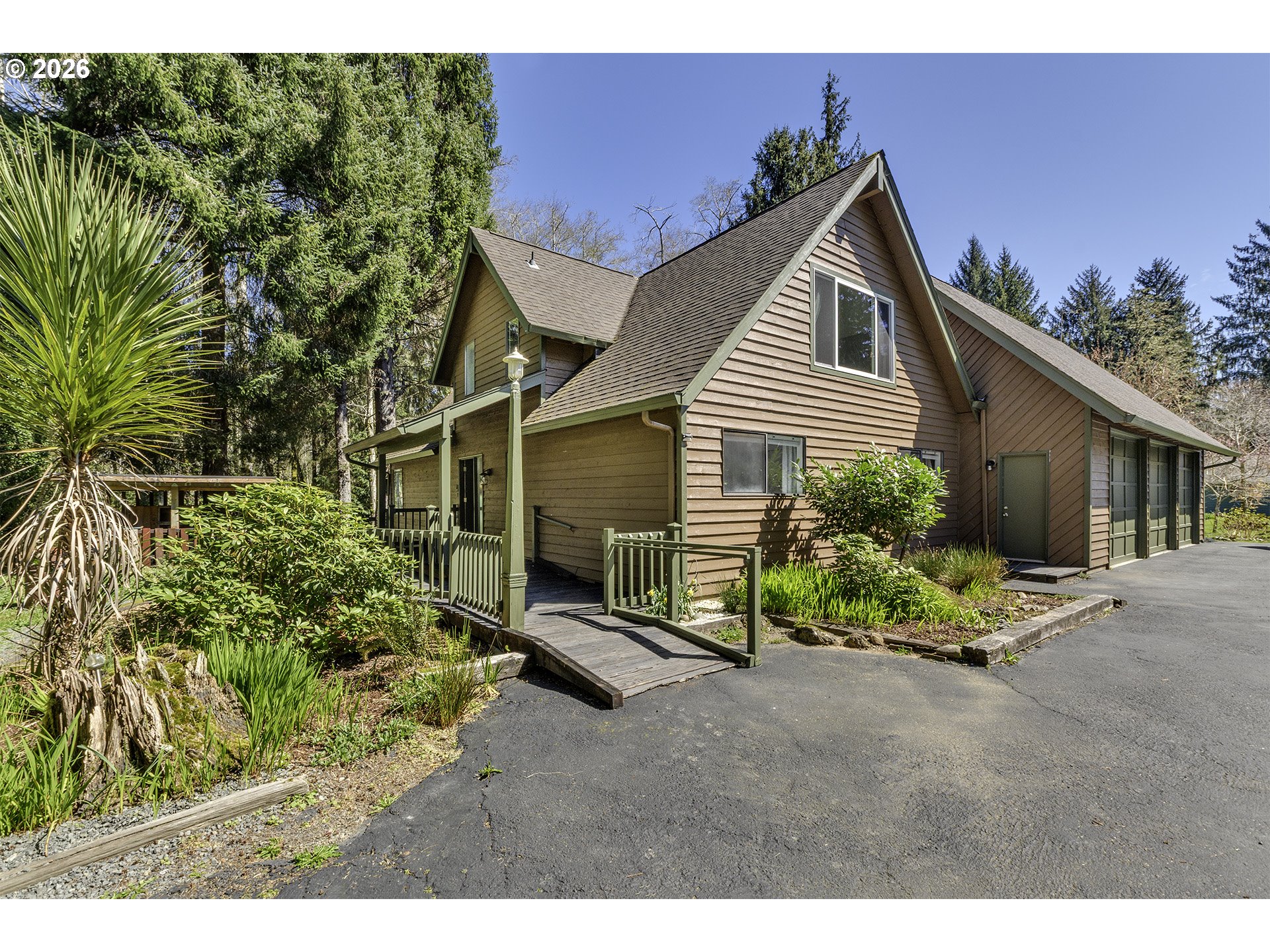 34049 West Campbell Loop Seaside, OR 97138 - Photo 2 of 48 a view of backyard with a patio