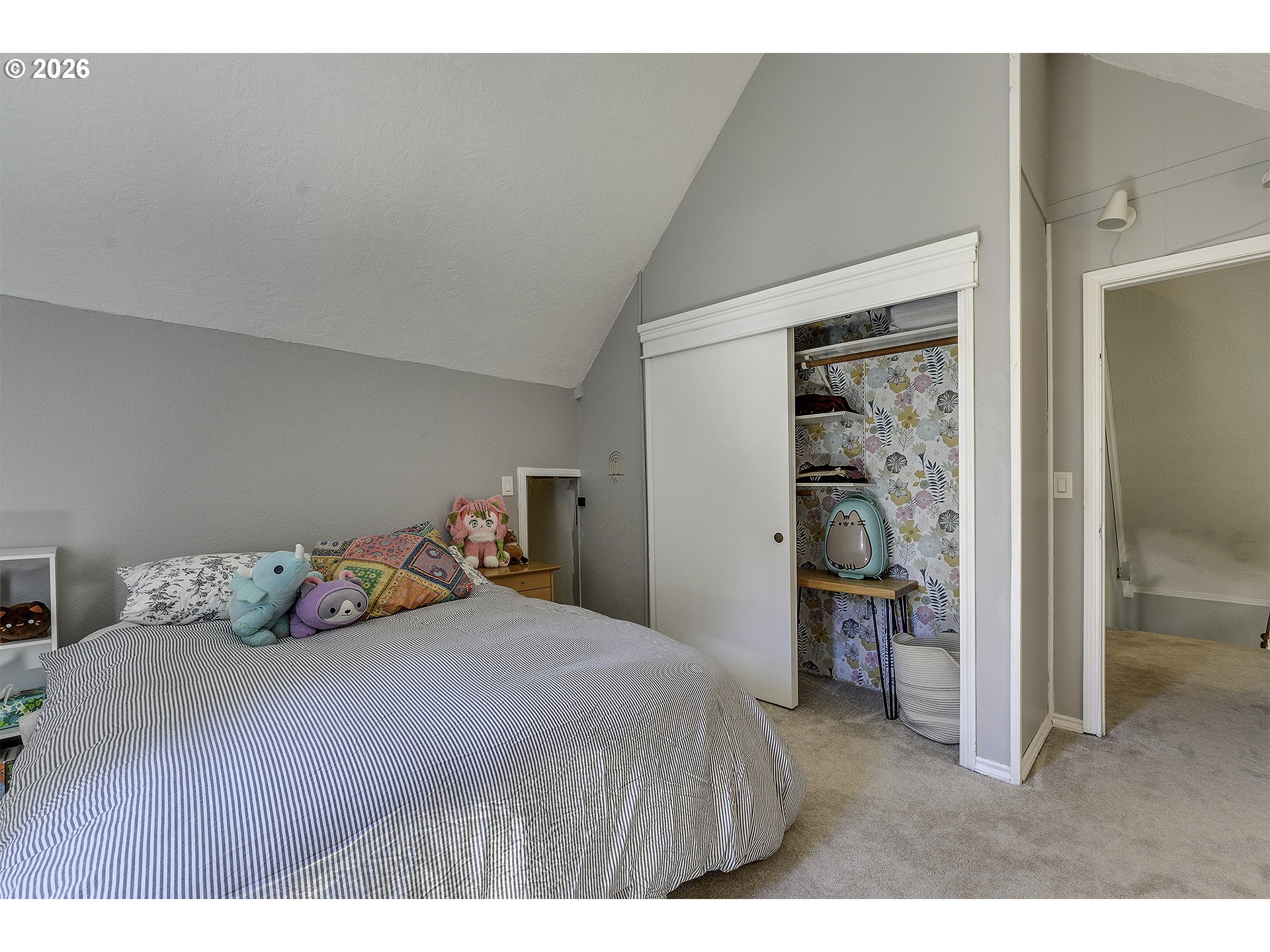 34049 West Campbell Loop Seaside, OR 97138 - Photo 31 of 48 a bedroom with a bed and a dresser