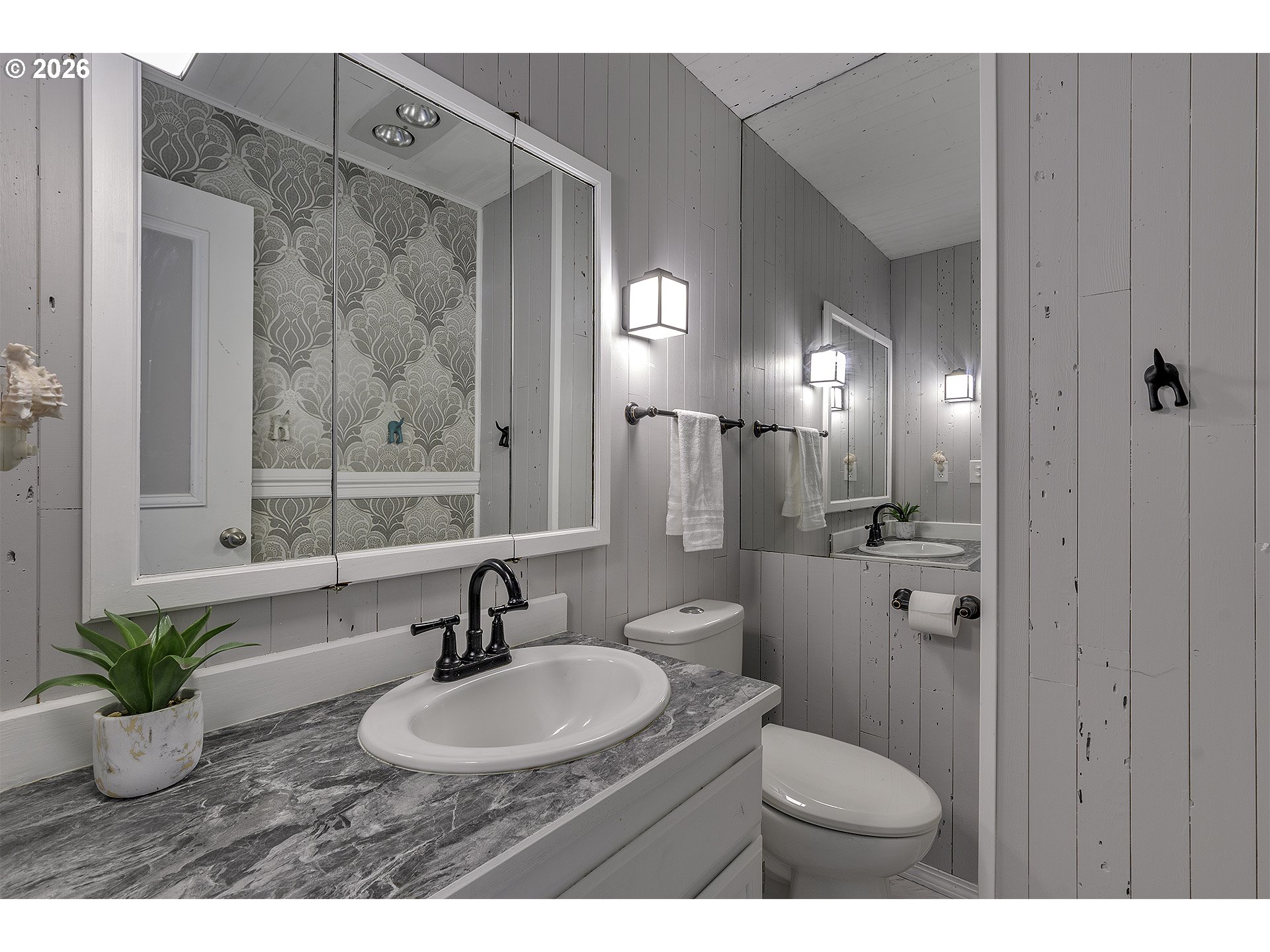 34049 West Campbell Loop Seaside, OR 97138 - Photo 33 of 48 a bathroom with a sink toilet and shower