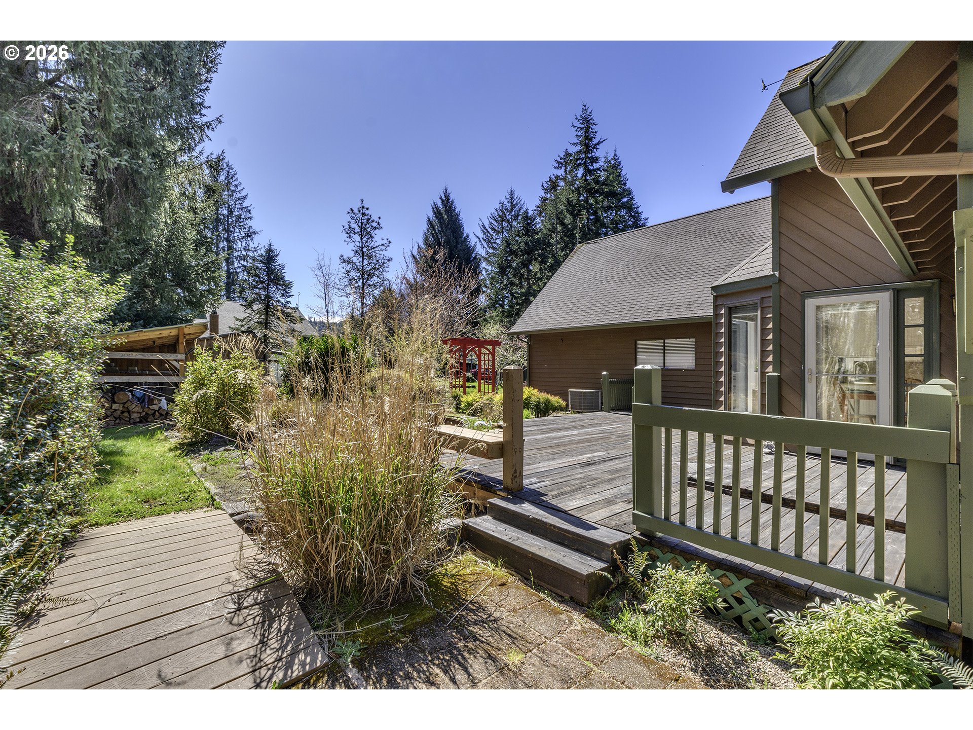34049 West Campbell Loop Seaside, OR 97138 - Photo 37 of 48 a view of a house with a yard