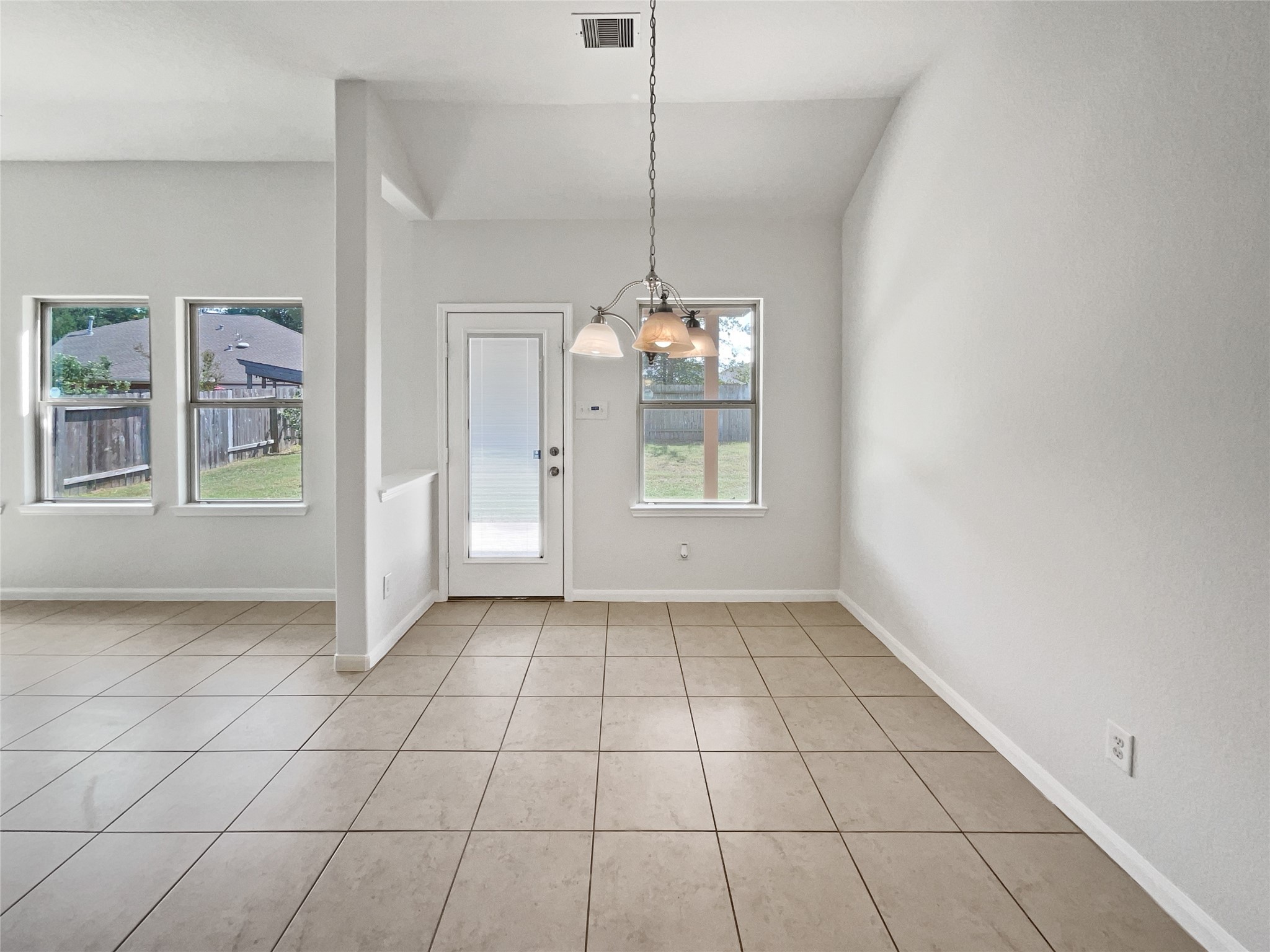 7323 Collins Manor Drive Spring, TX 77389 - Photo 12 of 22 a view of an empty room with a window