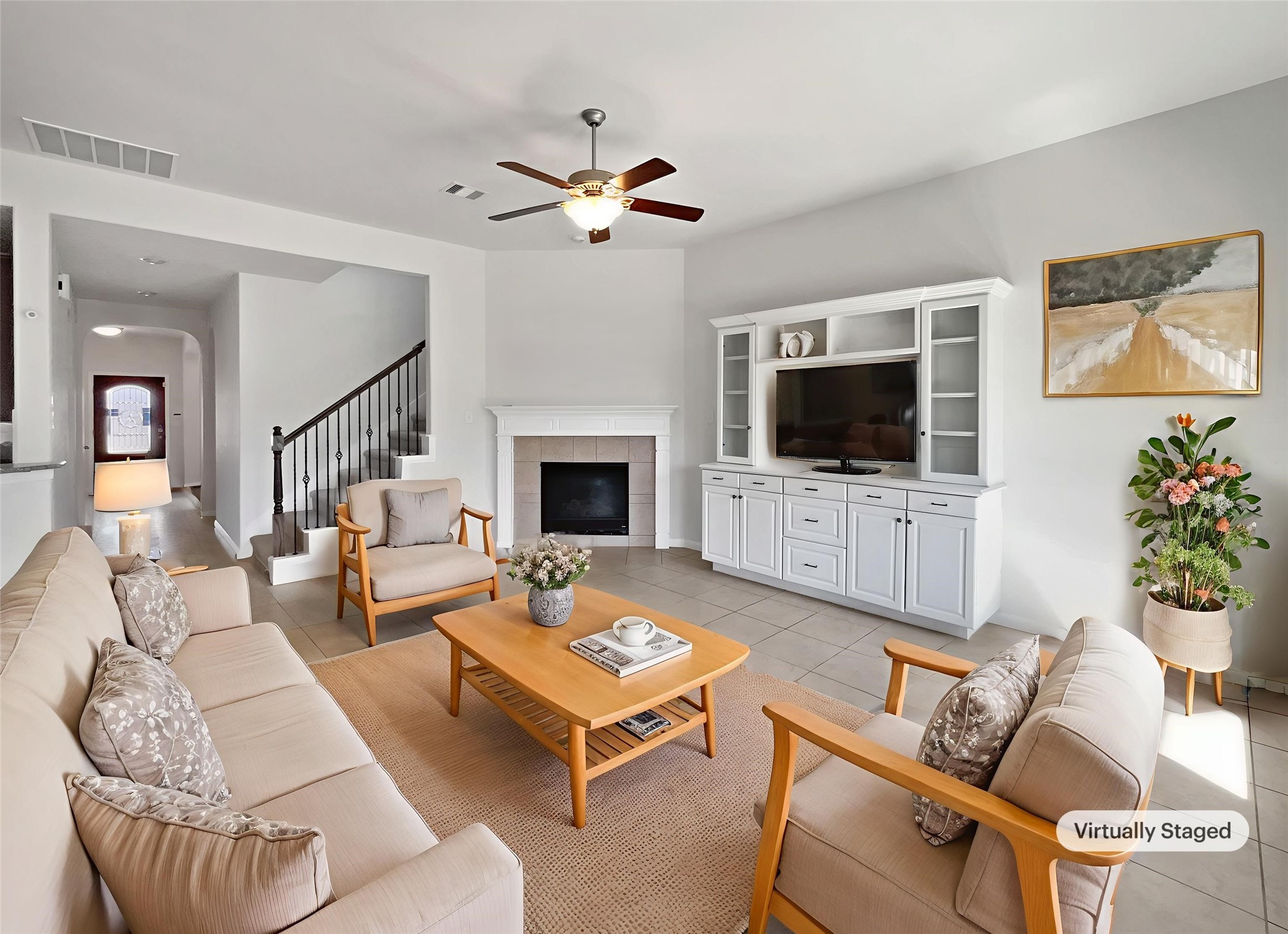 7323 Collins Manor Drive Spring, TX 77389 - Photo 2 of 22 a living room with furniture fireplace and flat screen tv