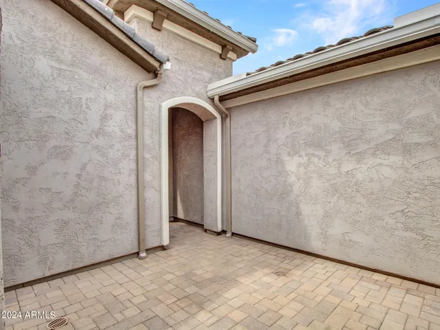 a view of hallway with wooden floor